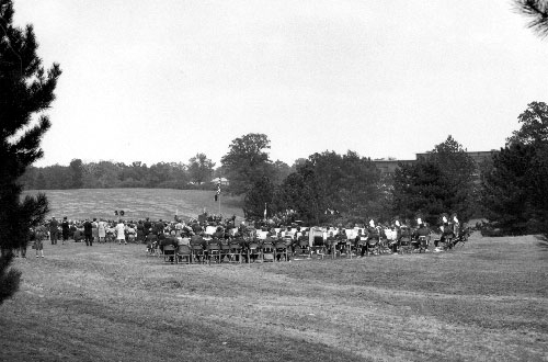 UMSL dedication attendees outside during 1960s