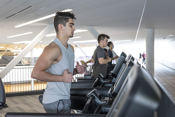 students running on treadmills