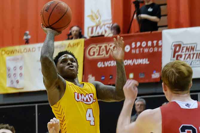 UMSL Basketball player making a shot during game