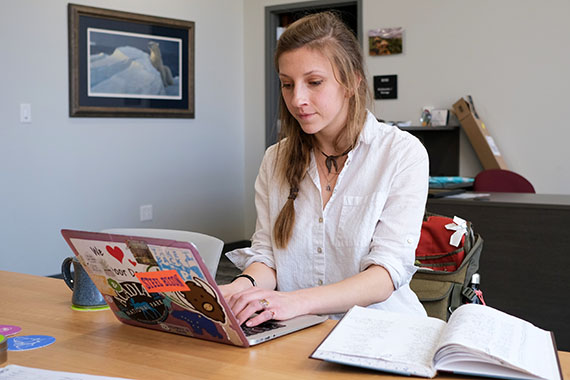 student working at laptop