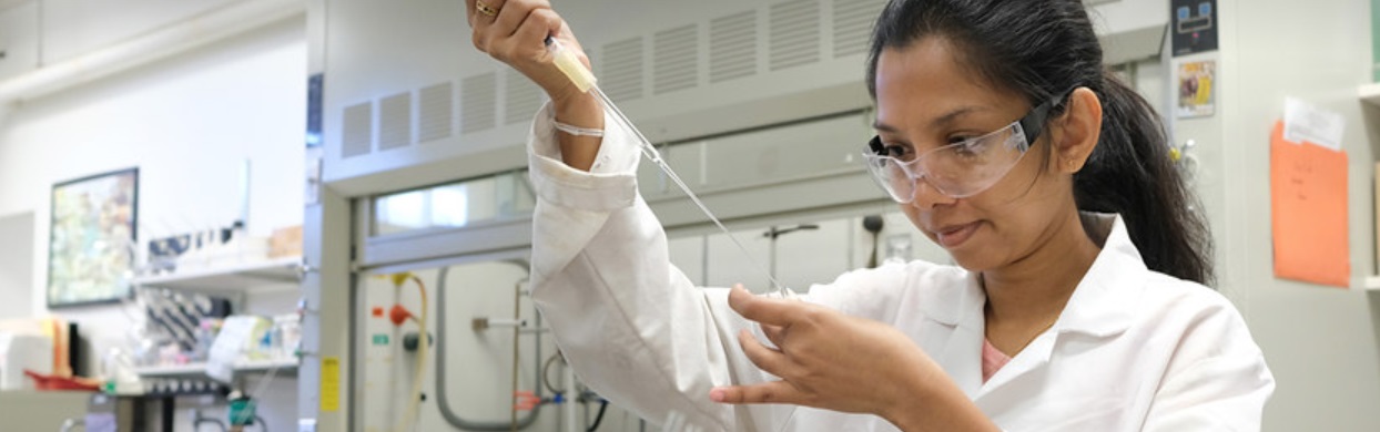 Student with pipette
