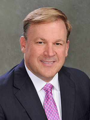 Headshot of Dave Reifschneider wearing suit and tie.