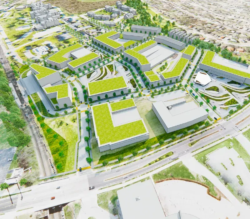 An aerial view of a possible development on south campus featuring multiple buildings, green spaces, and landscaped areas. 