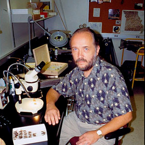 James Hunt at microscope