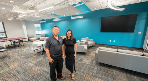 college members looking out of the big window 