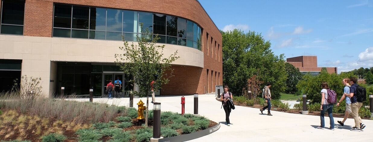 students walking in front of ABH