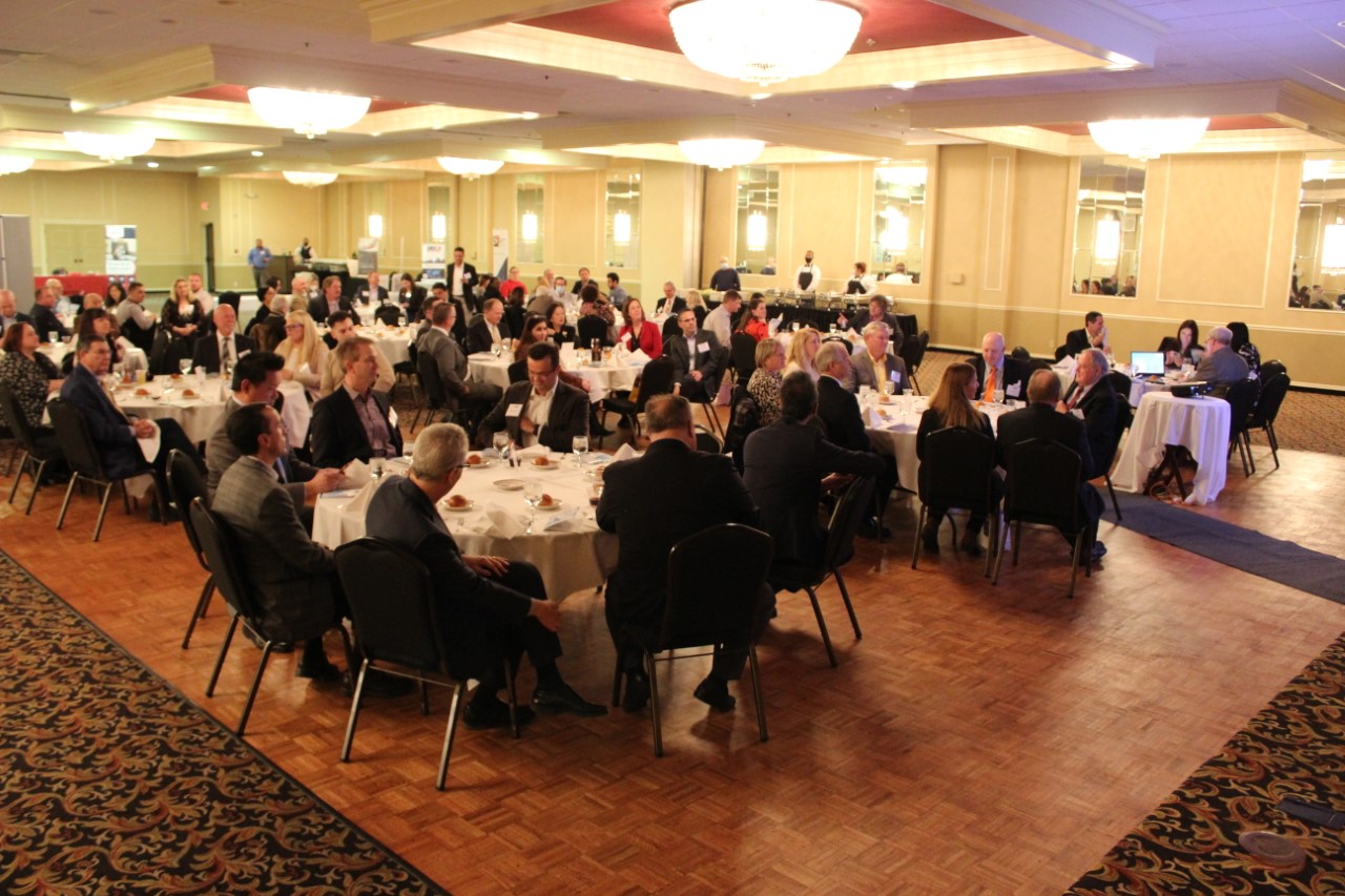 Image of people gathered at tables at the 2022 St. Louis International Business Night, February 15