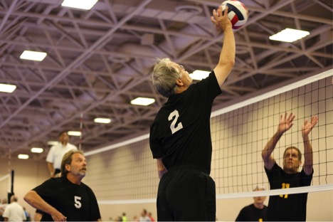Joe Martinich playing volley ball
