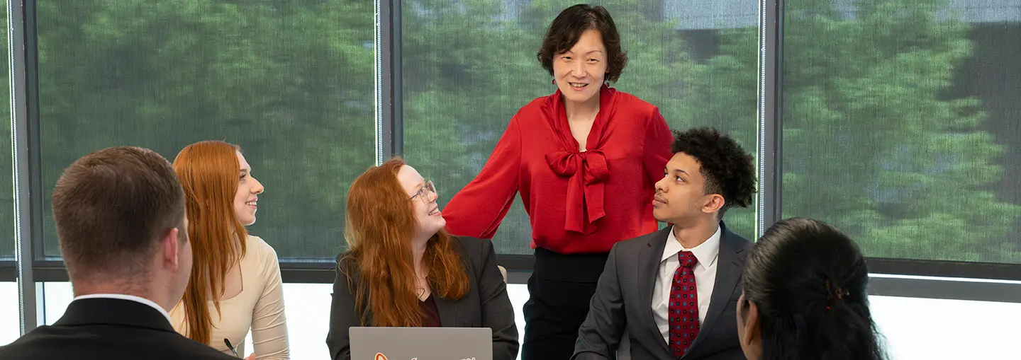 Dean Schiller with students