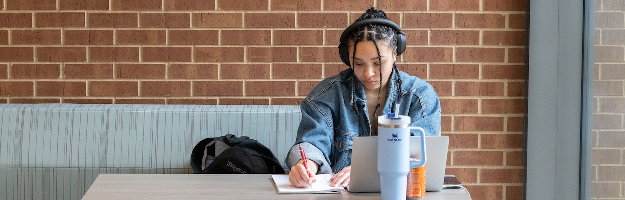 Student doing paperwork