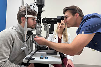 Female doctor, male student, male patient