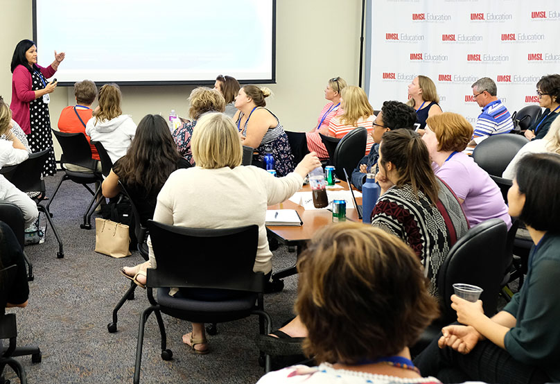 Teachers attend a conference