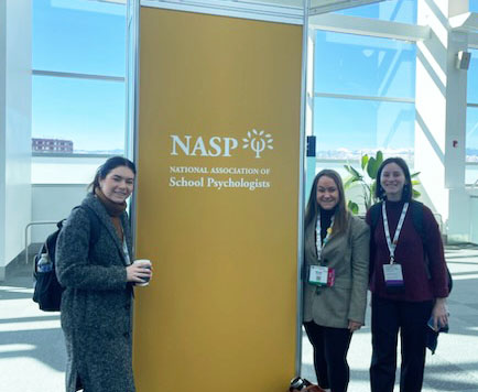 students with a NASP banner