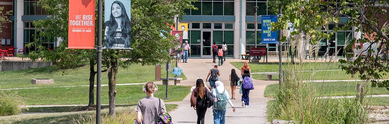 students walking between the ponds towards the MSC