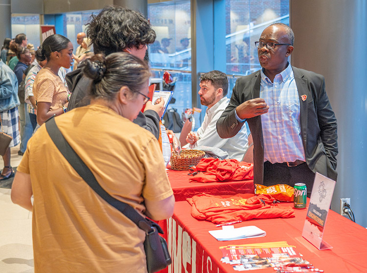 Dr. Nnanna engages with prospective students at a recruitment event