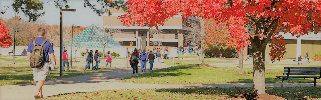 students walking on campus in the fall