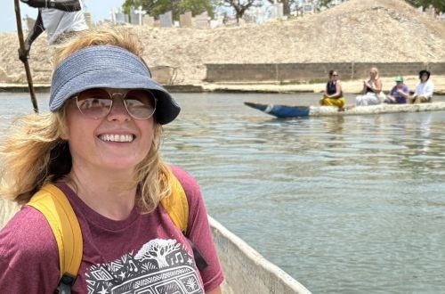 Professor Violaine White in a boat in Senegal