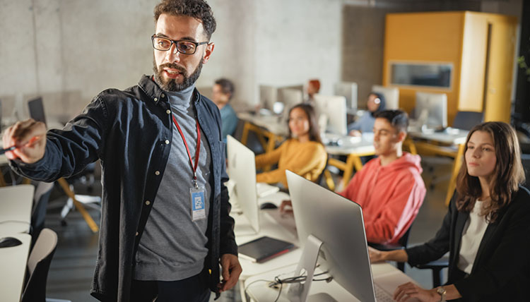 teacher in front of a small class