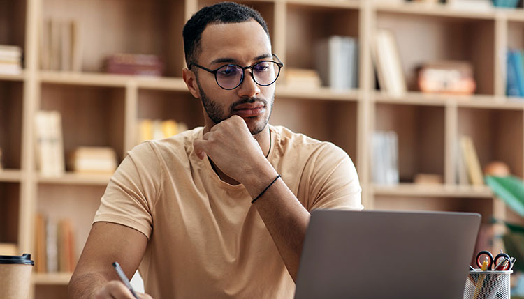 student working on a laptop