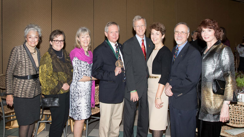 Left to right: Anna Harris, Patty Parker, Birgit and Robert Bateman, Virgil and Sandra Van Trease, Chancellor Tom George, Barbara Harbach