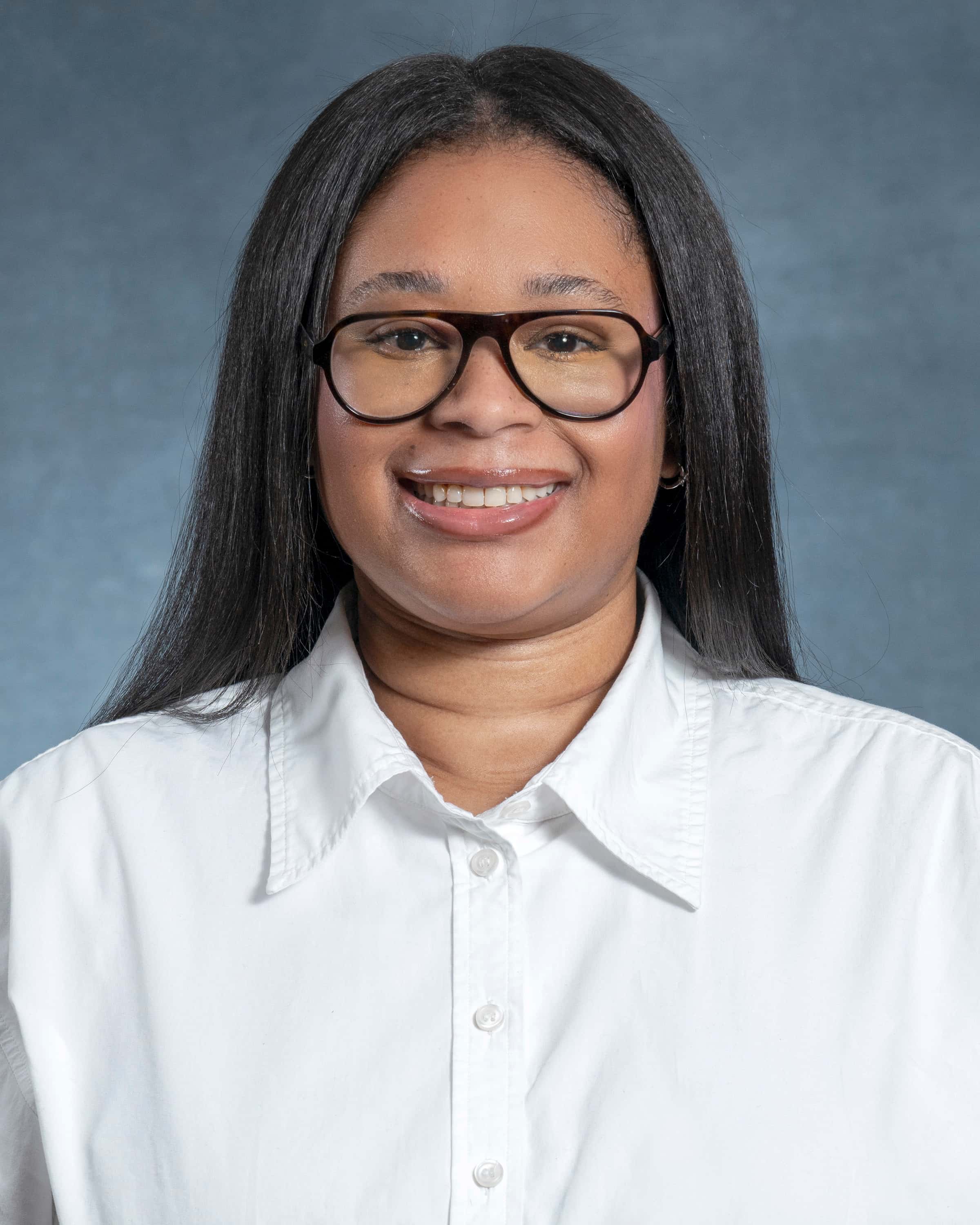 Headshot of Brienna Manore, ACP Director