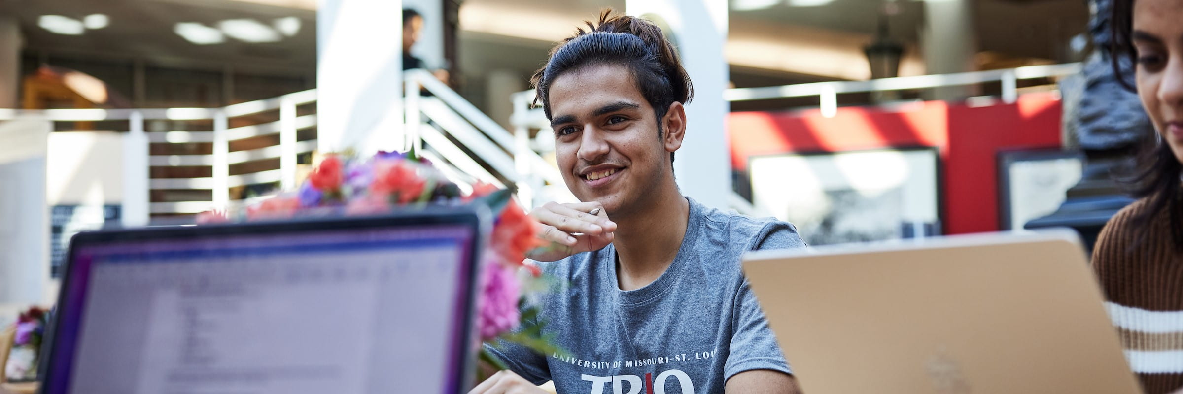 A student in a group study session