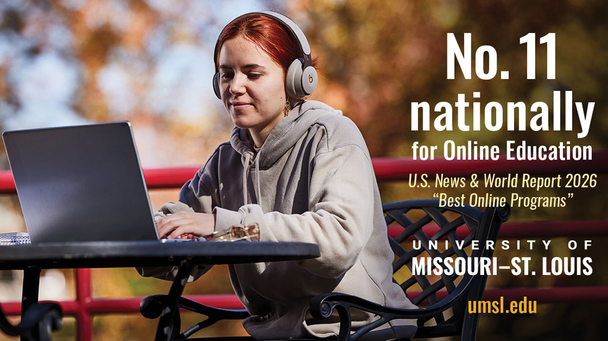 Student using a laptop outdoors, representing the University of Missouri-St. Louis, which ranks No. 11 nationally for online education according to U.S. News & World Report 2026.