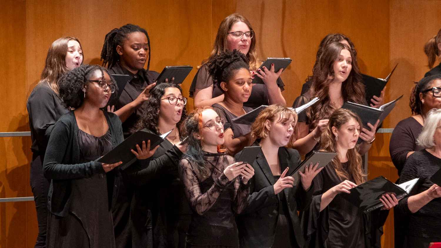 group of UMSL students singing