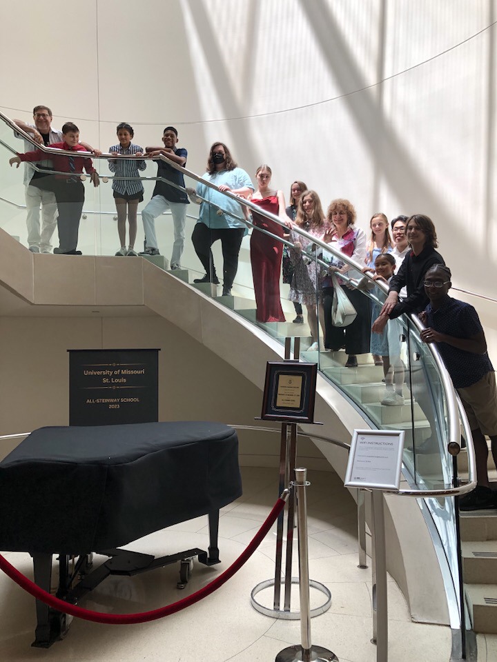 Piano camp students on Touhill stairs