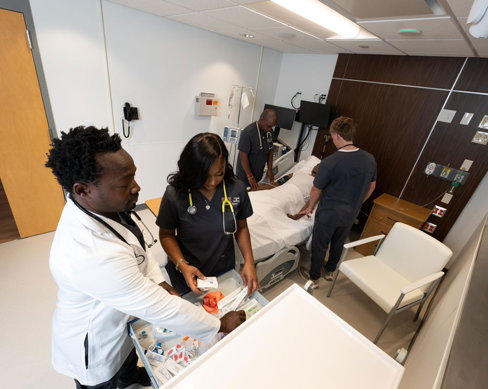 nursing students with child simulation patient
