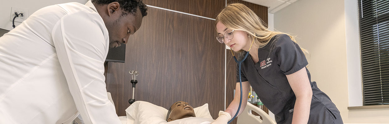 nursing students in the simulation lab