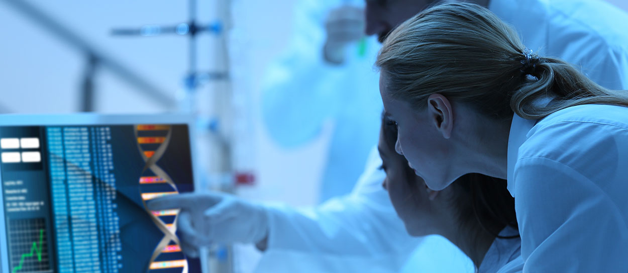 Lab technicians working with equipment