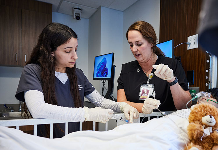 nursing student with professor