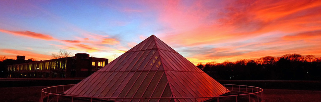 a building at sunset
