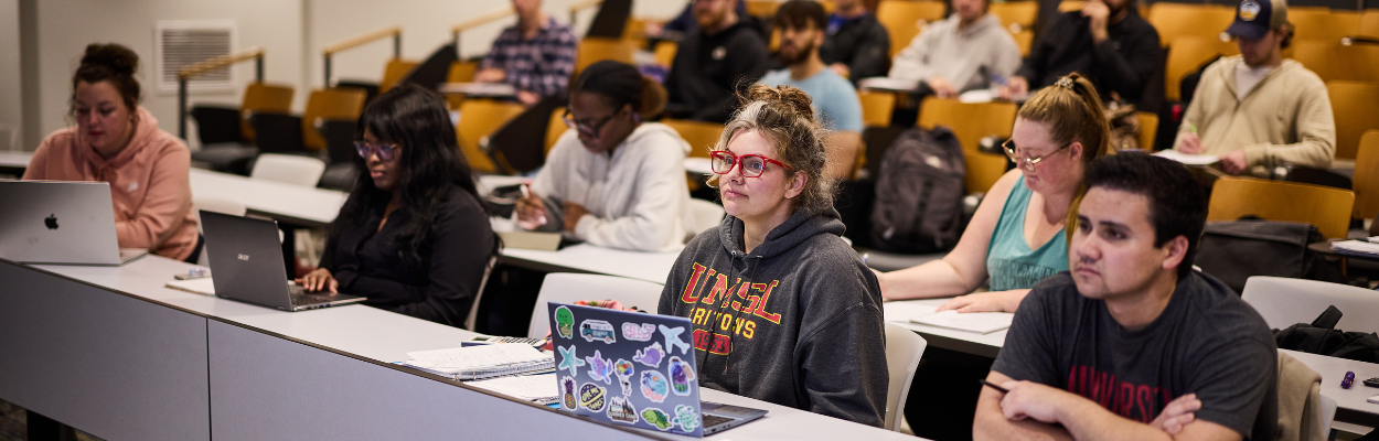 students in auditorium learning 