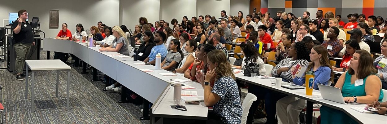 A group of people in a lecture hall