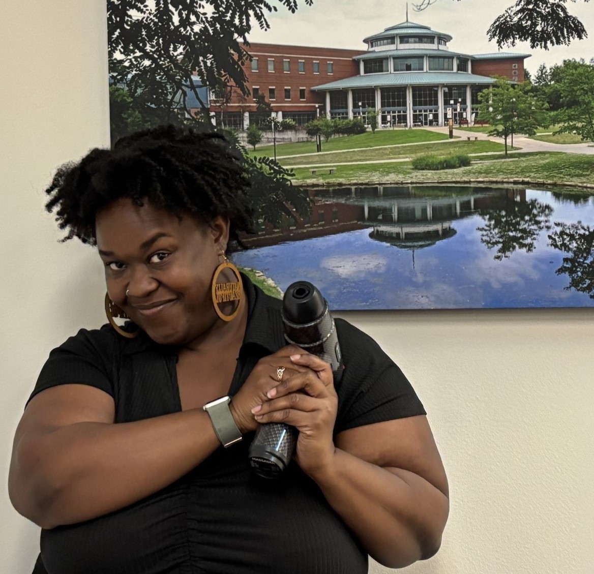 Valonda holding her prize from the triton walking club.