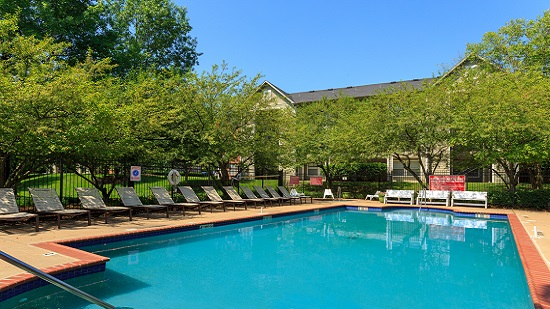 Photo of Meadows pool surrounded by small trees