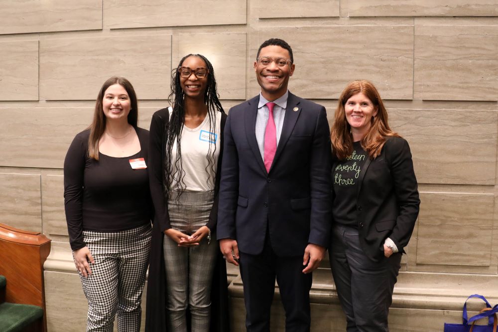 Picture of Professor Courtney McDermott and three Social Work students