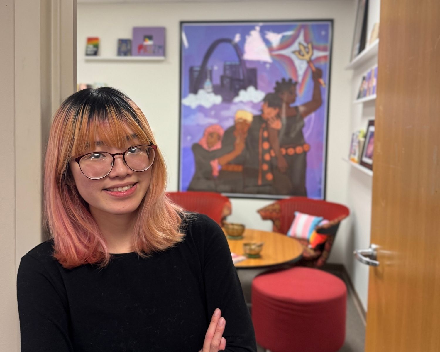Headshot of Julee Chau posing in front of Louie's Closet