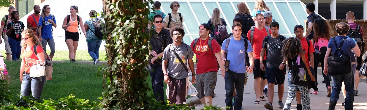 students walking by the pyramid