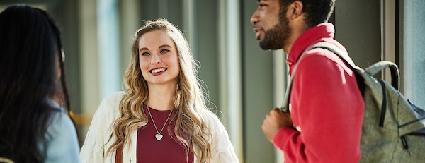 Three student having a conversation