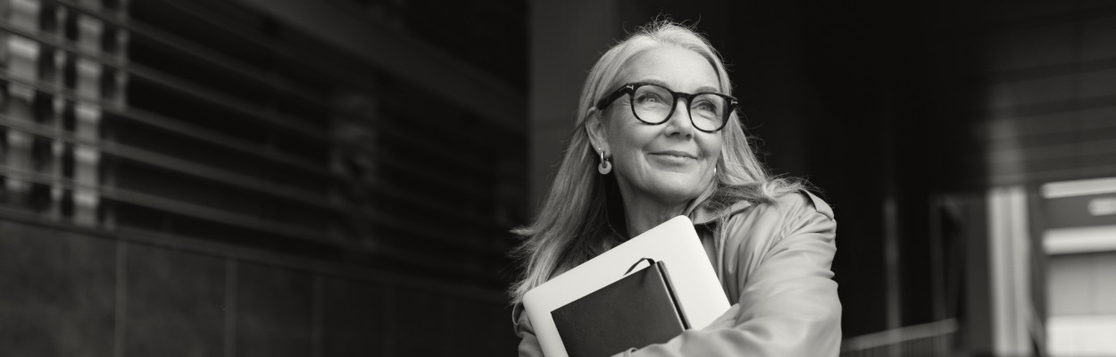 image of woman holding books