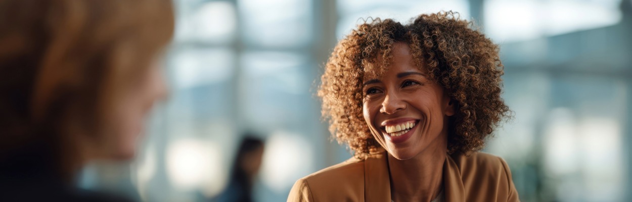 Someone smiling and looking off to the right