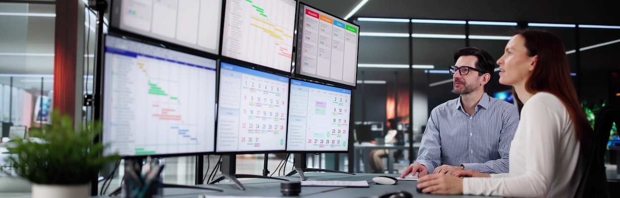 two workers at comptuer