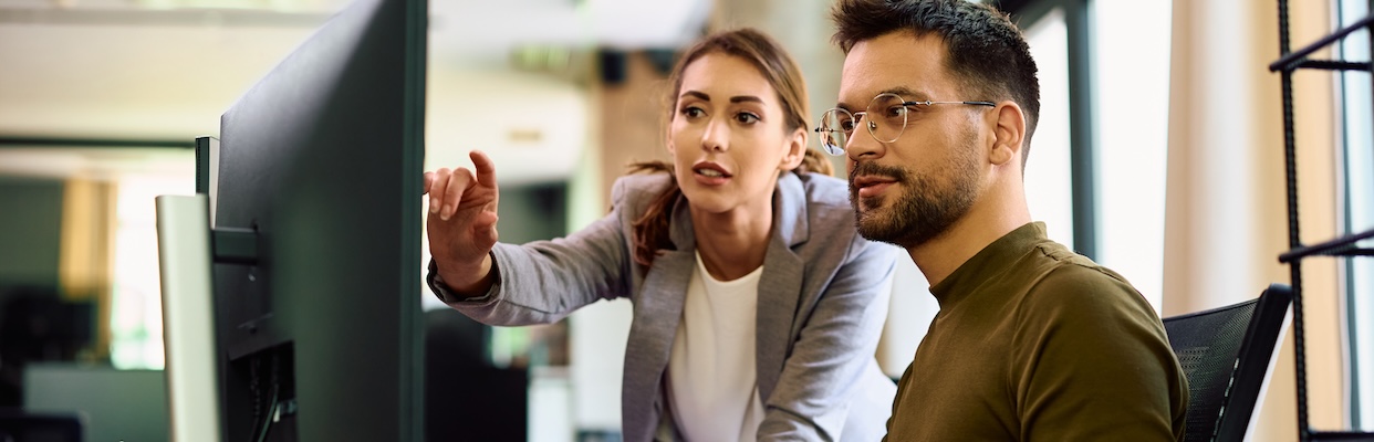 two people at computer