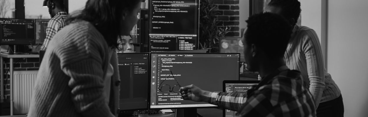 workers around a computer