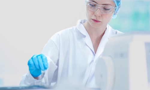 Woman processing some materials to make sure they are sterile