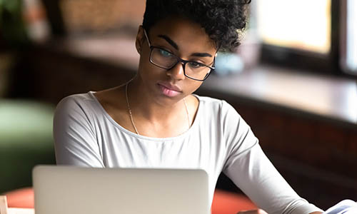 Picture of someone working on computer